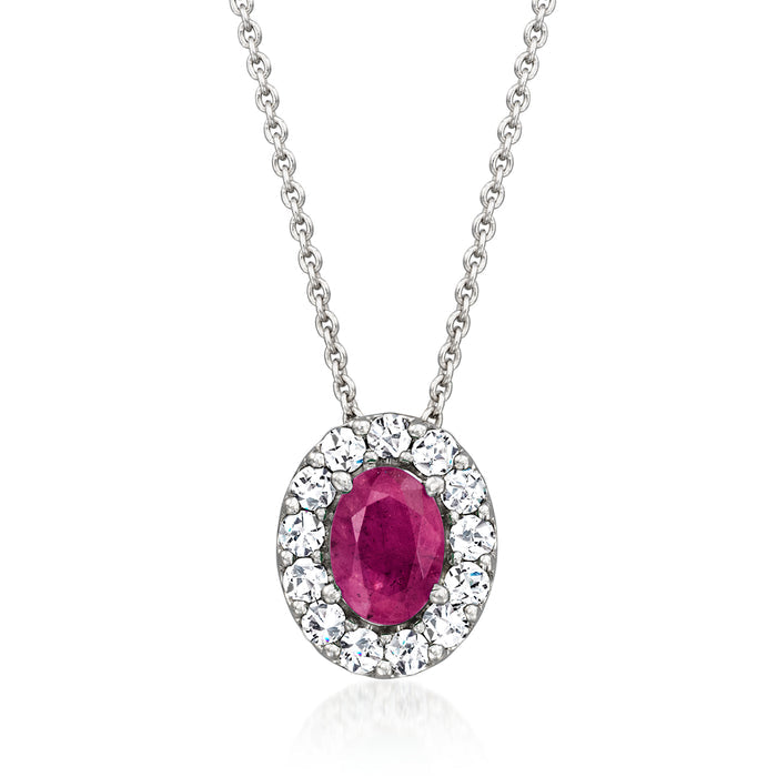 Sterling silver oval ruby pendant with diamond halo on a link chain necklace