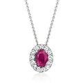 Sterling silver oval ruby pendant with diamond halo on a link chain necklace