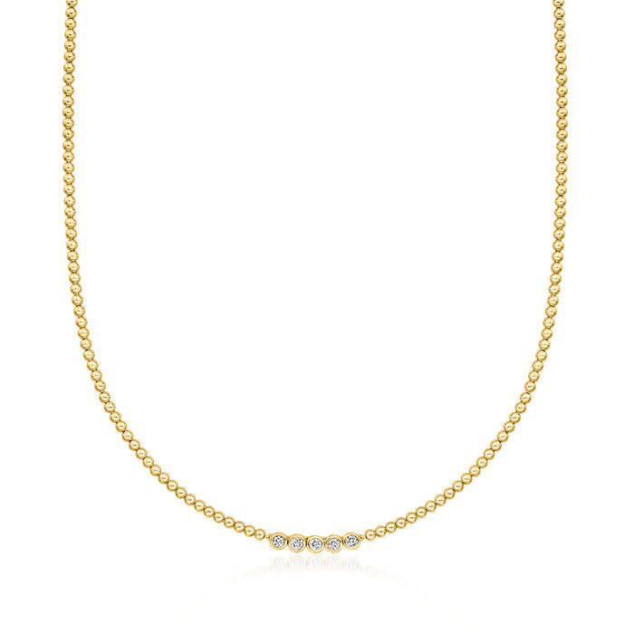 Gold beaded necklace with bezel-set round diamond accents