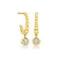 Gold-tone bubbly hoop earrings with round dangling stone