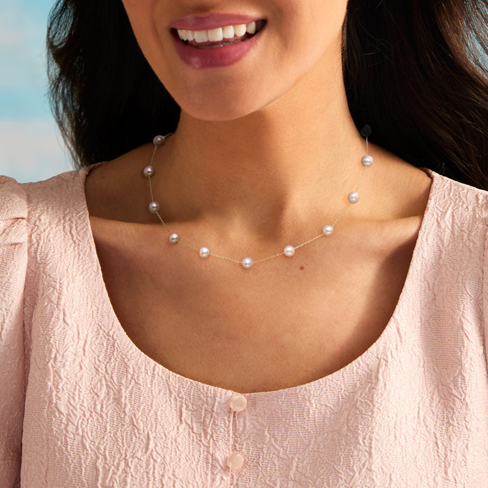 Pink cultured pearl necklace on model, 14kt yellow gold chain with round pearls