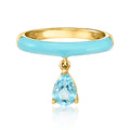 Gold ring with light-blue enamel band and pear-shaped blue topaz drop