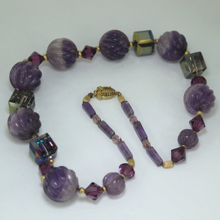 Brilliant Purple Bead Necklace Iridescent Cube Possible Brighton table view