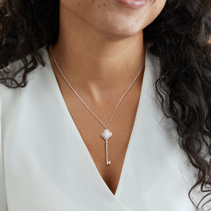 Sterling silver key necklace with mother-of-pearl clover pendant, CZ sparkle accents